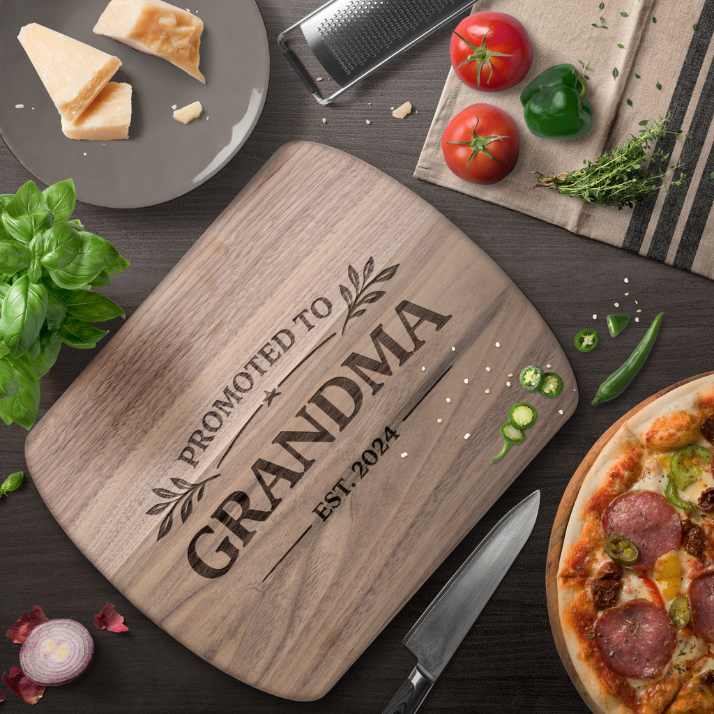 Promoted_To_Grandma_Cutting_Board_Dark_Rounded_H_Lifestyle_Mockup.png_15440615